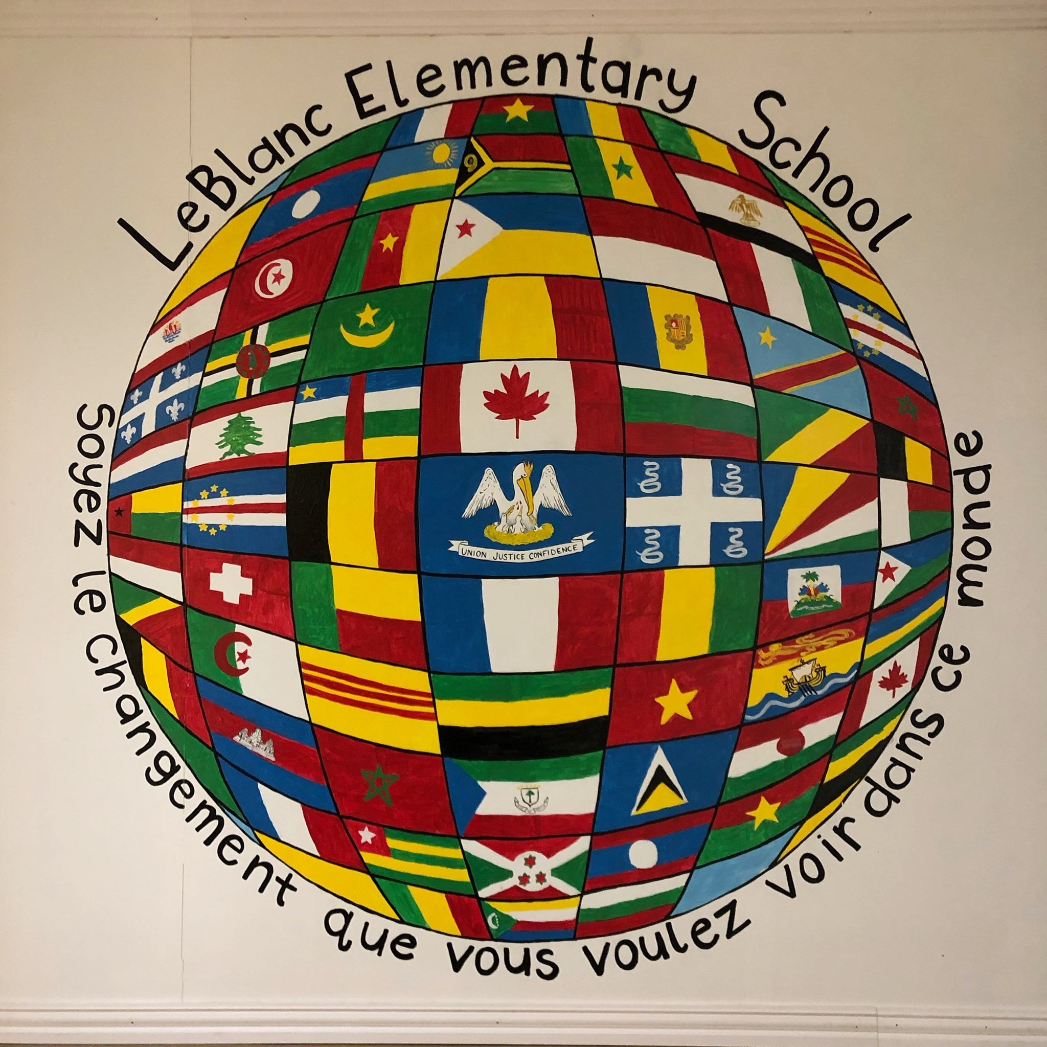 Mural of francophone flags at Leblanc Elementary School